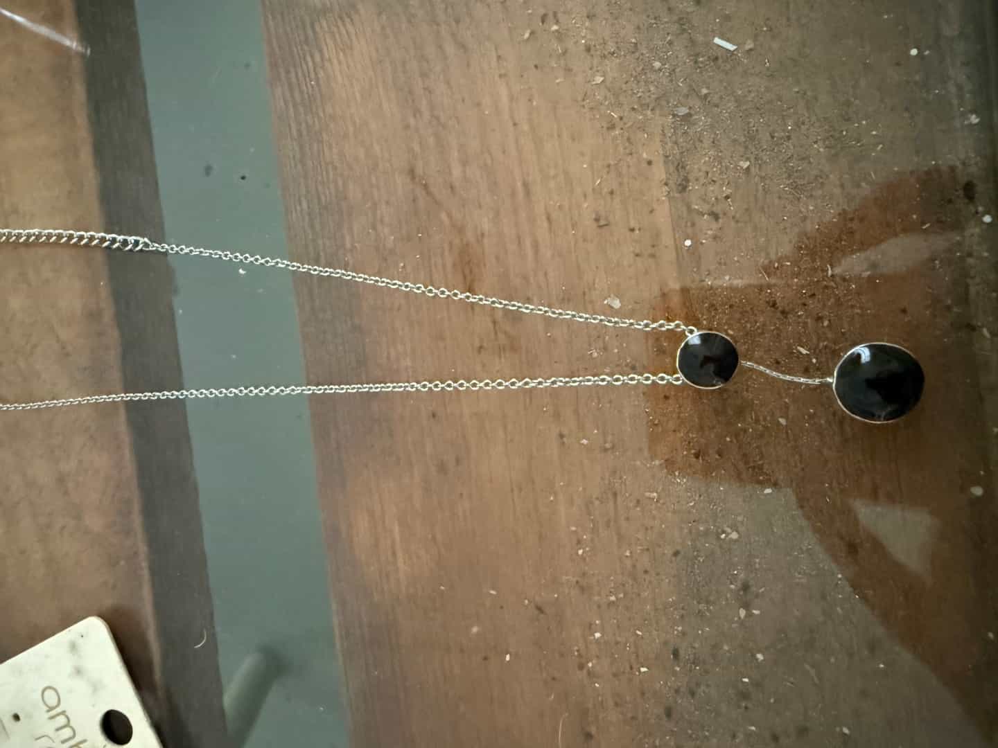 Silver Tone Necklace with Black Circular Pendants