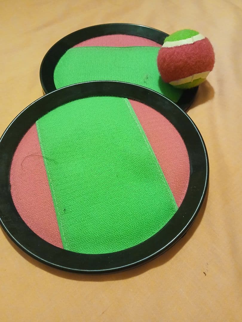 Set of 2 Green Red Pop Up Paddles with Balls - Image 1 of 1