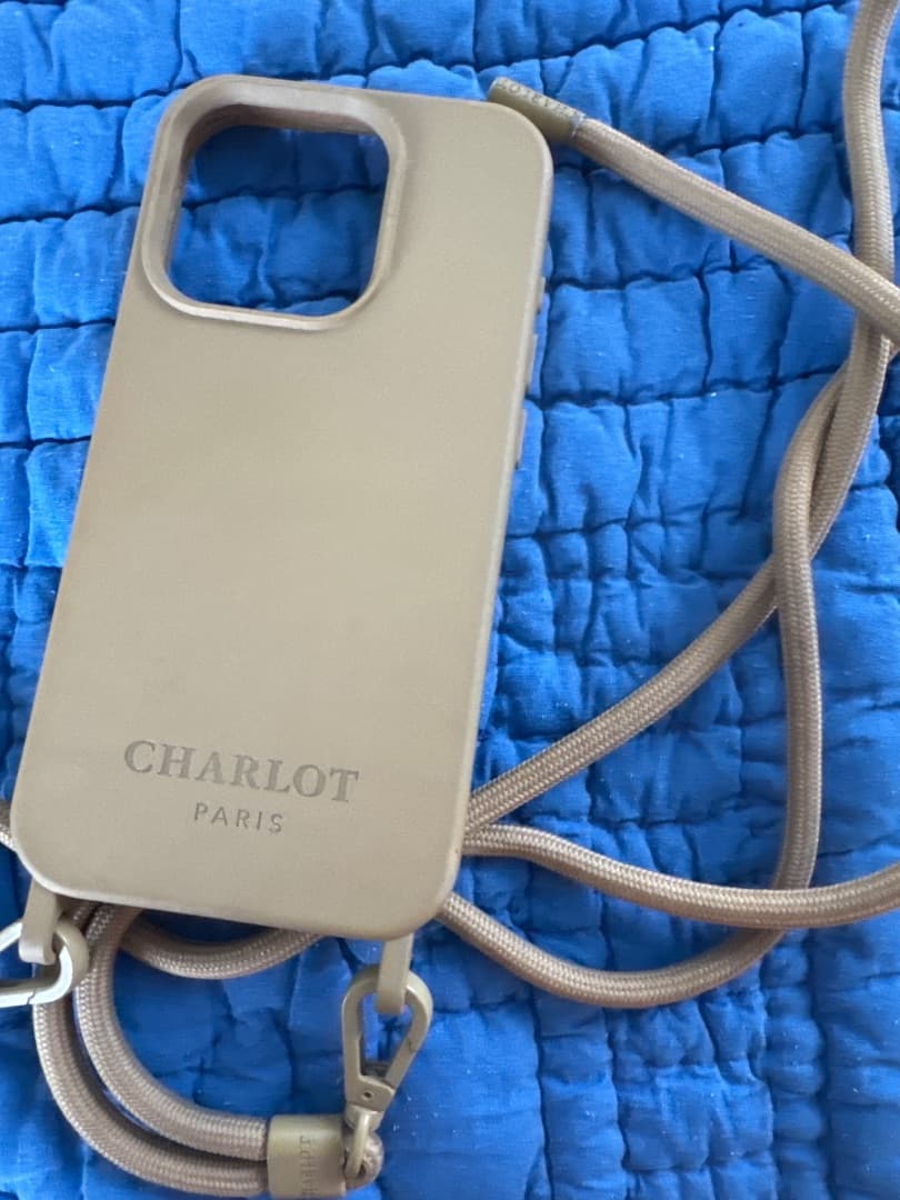 Charlot Paris iPhone 15 Pro Case with Strap Beige - Image 1 of 3