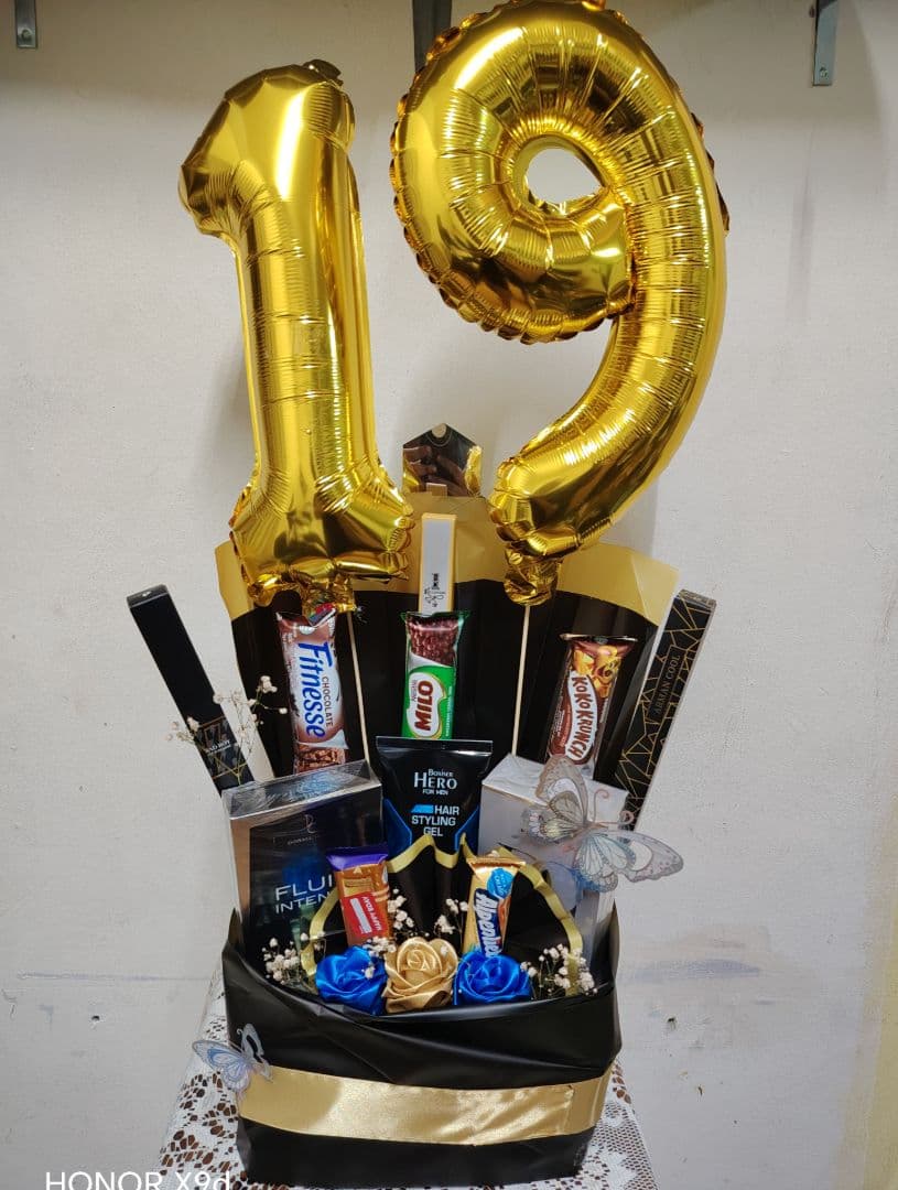 19th Birthday Gift Bouquet with Snacks and Grooming Items - Image 1 of 1