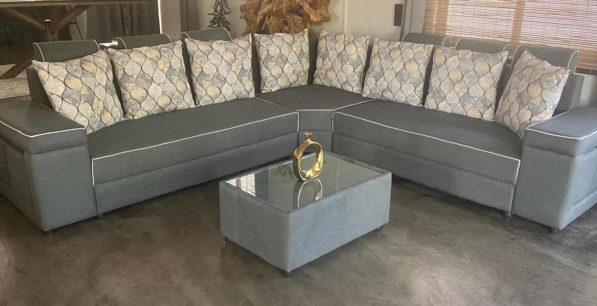 L-Shaped Grey Fabric Sofa with Patterned Cushions